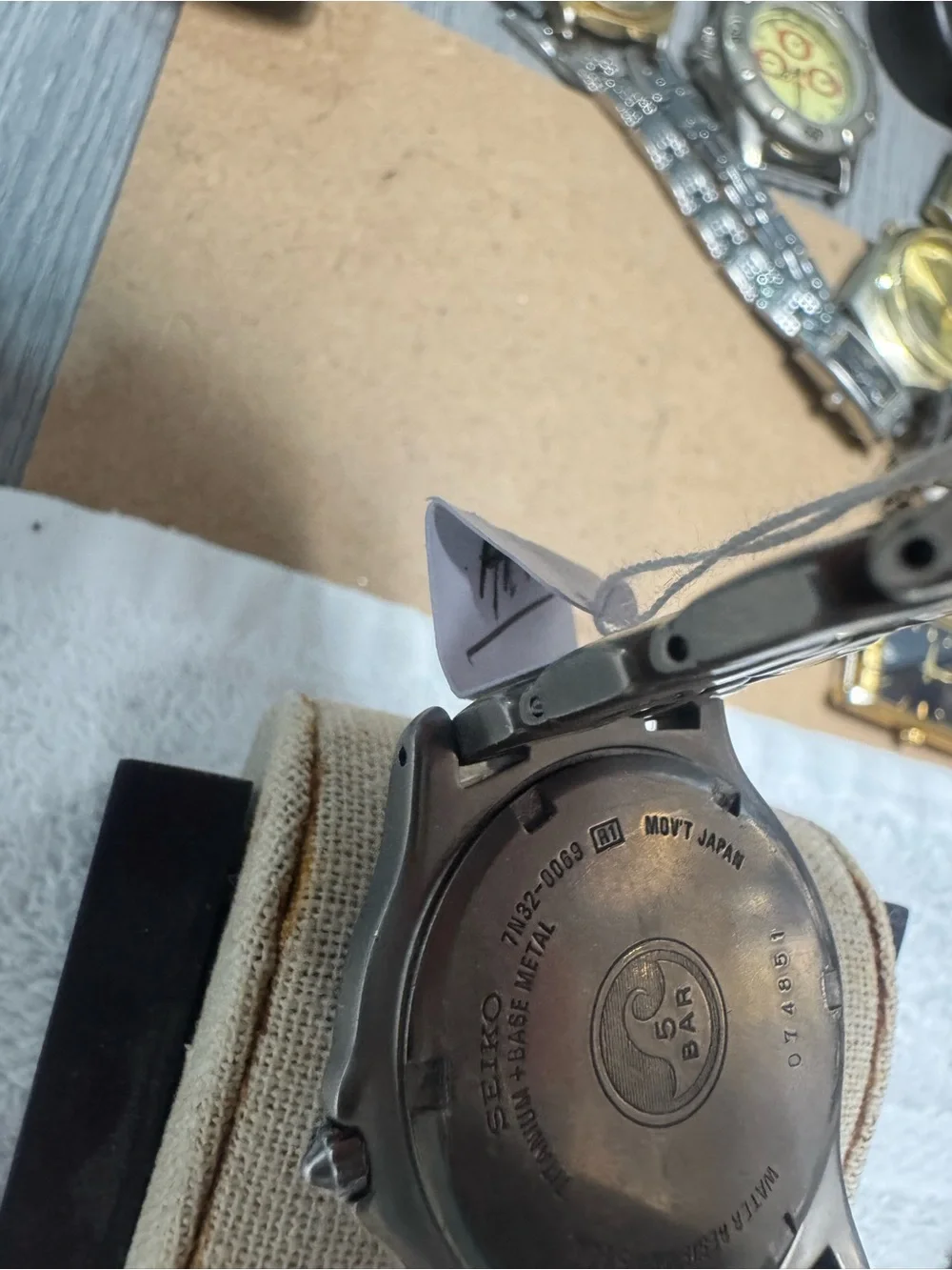 Seiko Titanium Watch with Black Dial and Silver Accents